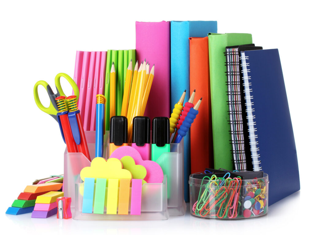 bright-stationery-and-books-isolated-on-white